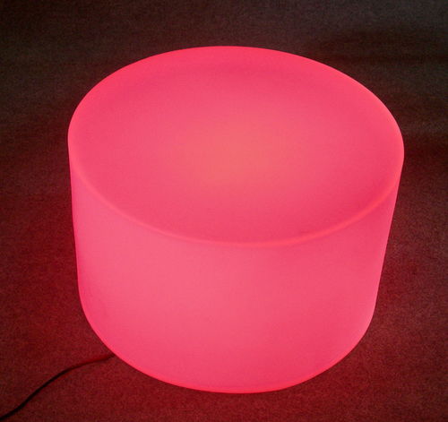 Espositore cilindrico illuminato da lampada rossa