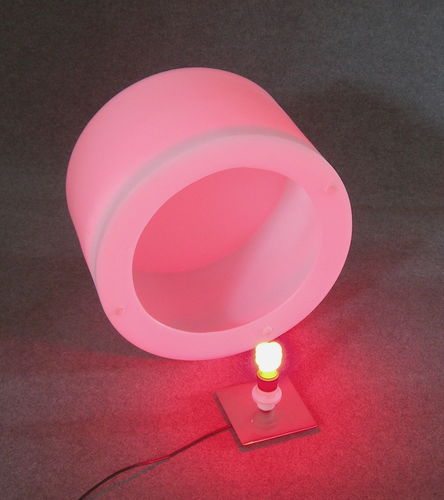 Espositore illuminato da lampada a basso consumo colorata